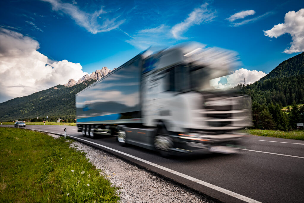 fuel truck rushes down the highway in the backgrou 2023 11 27 05 23 51 utc